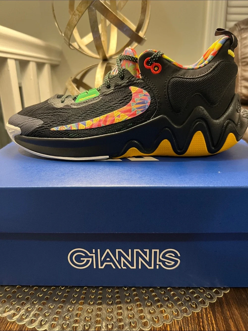 Nike Kids Black Sneakers with Yellow Accents and Multicolor Swoosh